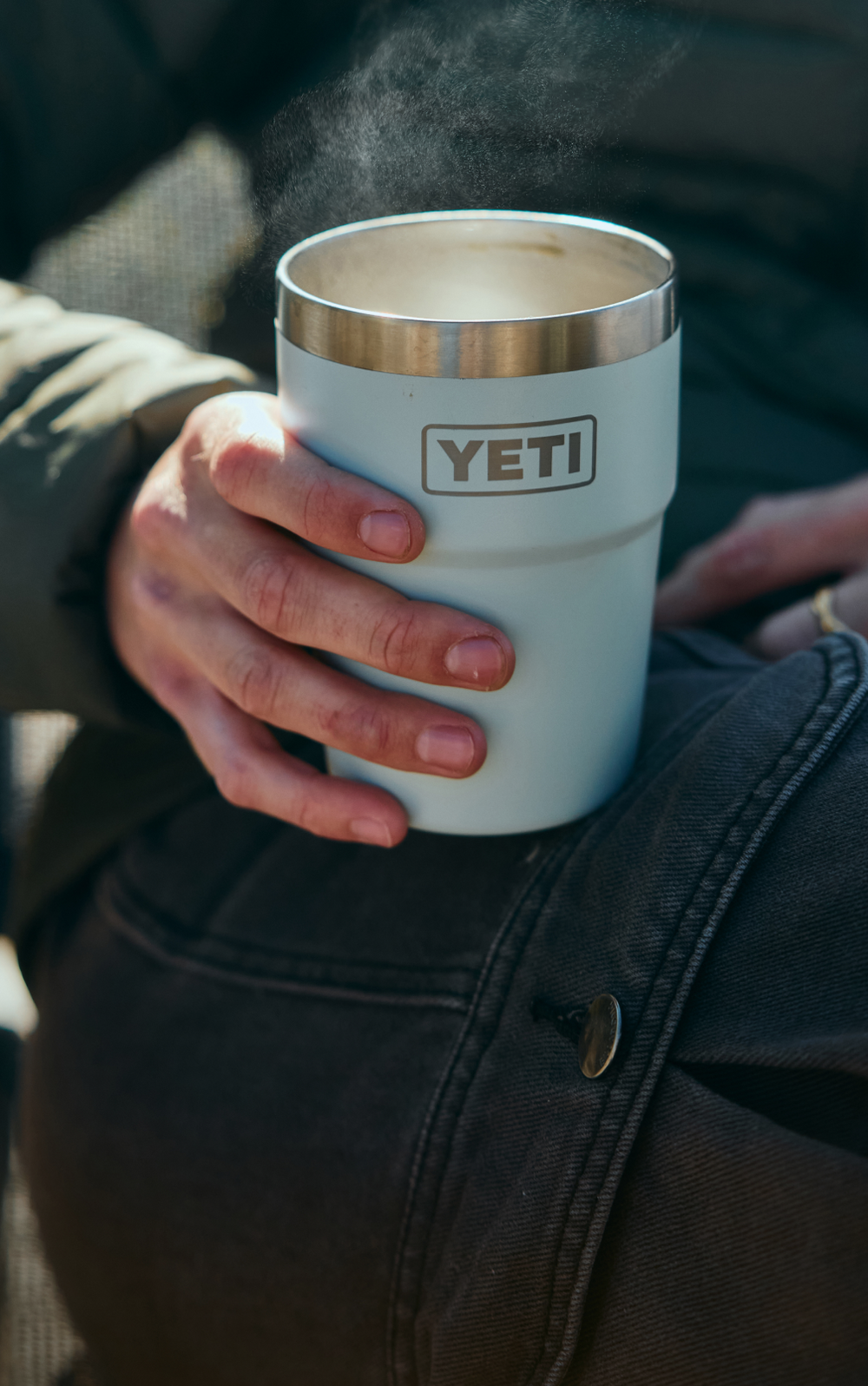 YETI Rambler tumbler in hand with steam